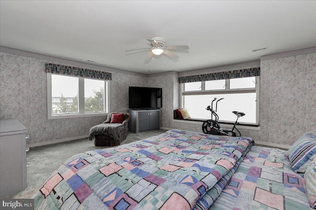 bedroom with light carpet and ceiling fan