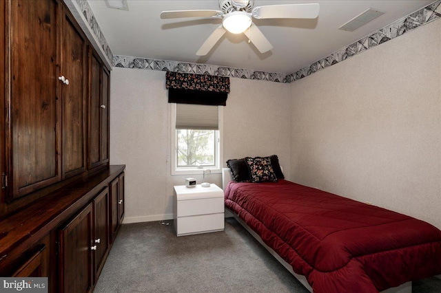 bedroom featuring light carpet and ceiling fan