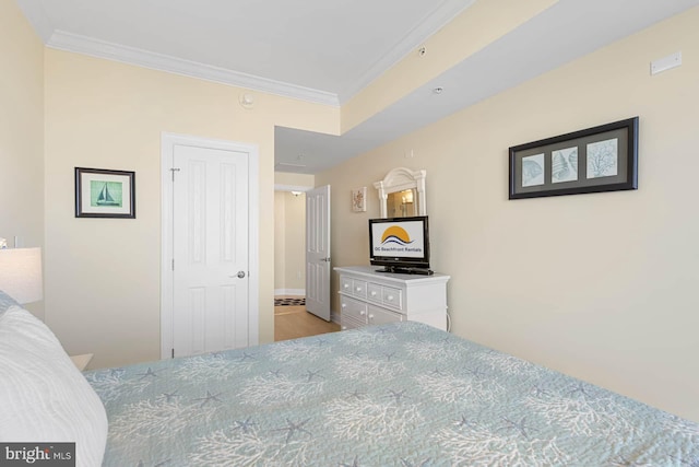 bedroom featuring crown molding