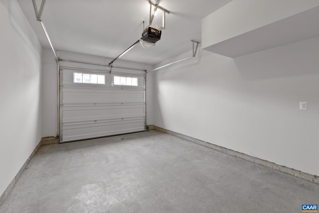 garage featuring a garage door opener