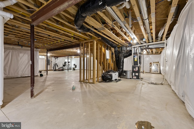 unfinished basement with heating unit