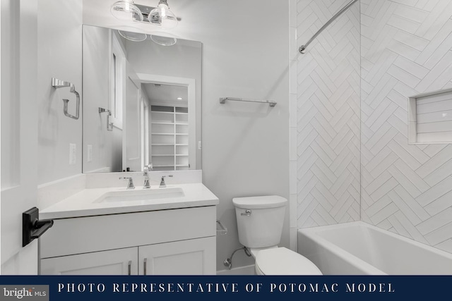 bathroom featuring toilet, vanity, and shower / bath combination
