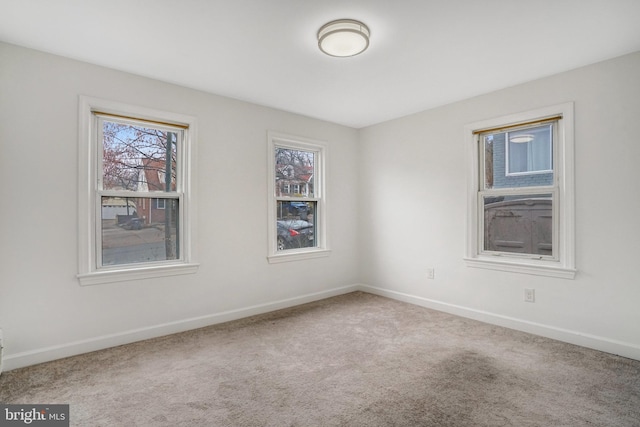 spare room with carpet flooring