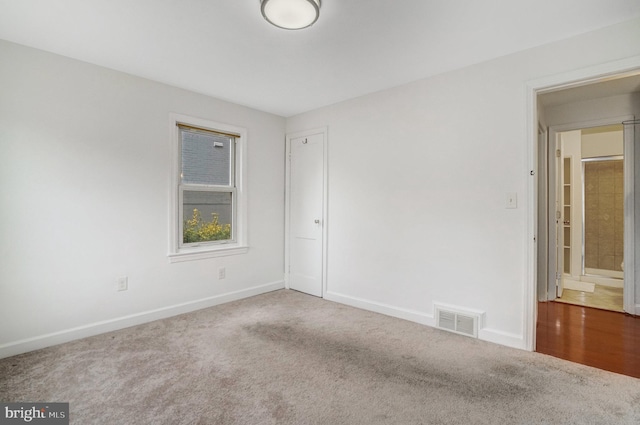 spare room with carpet floors