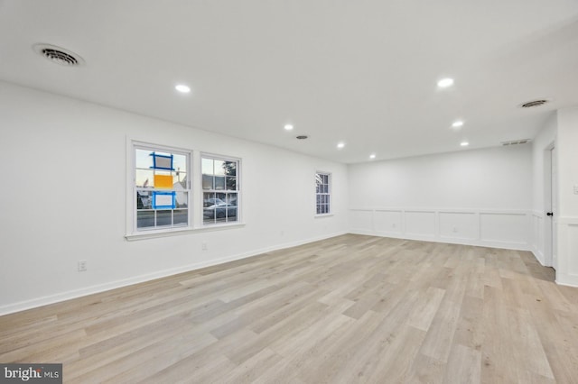 unfurnished room featuring light wood-type flooring