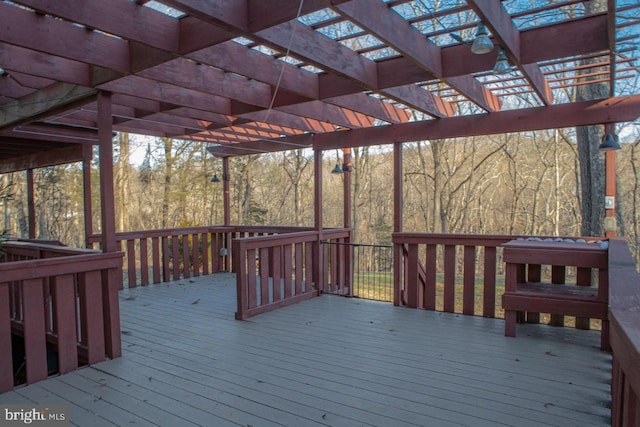 wooden terrace with a pergola