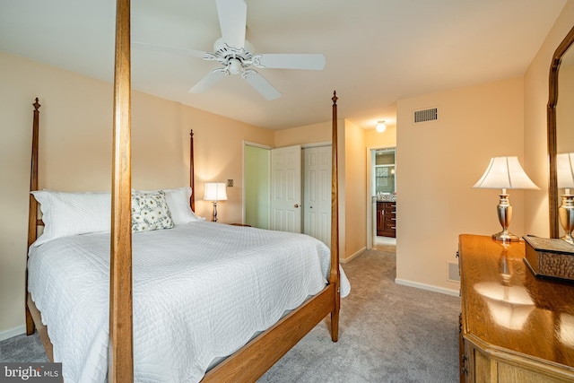 bedroom with baseboards, visible vents, ceiling fan, a closet, and carpet flooring