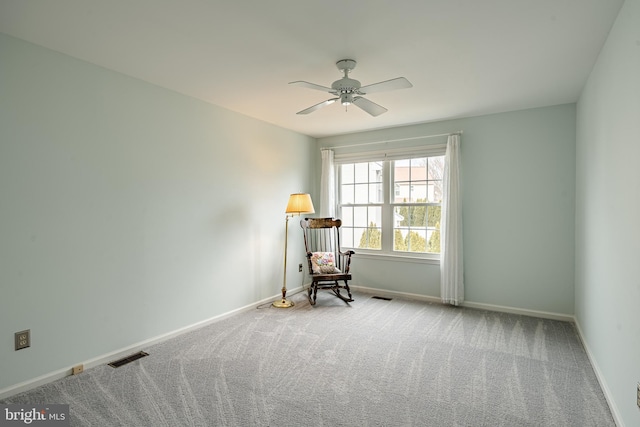 unfurnished room featuring visible vents, baseboards, and carpet flooring