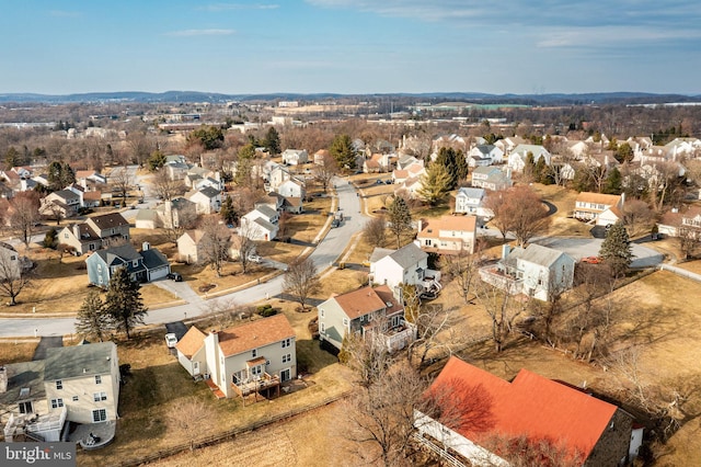 birds eye view of property with a residential view