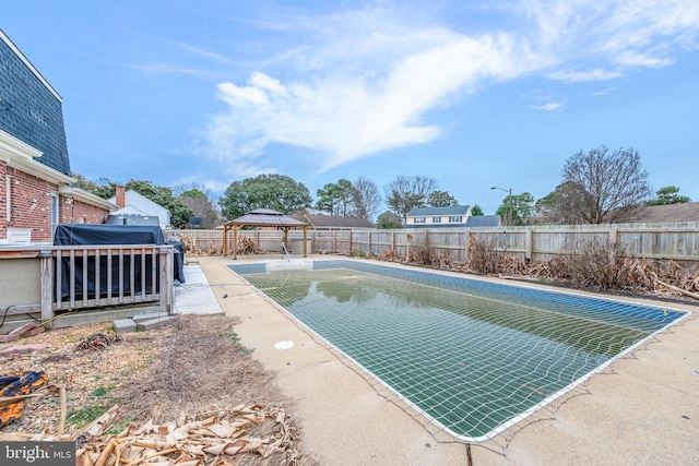 view of swimming pool featuring a gazebo