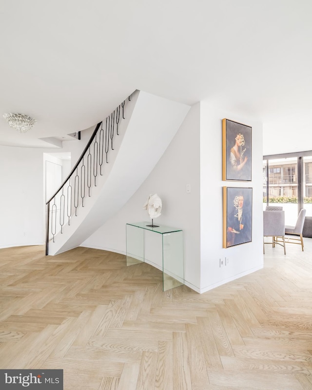 stairway with parquet floors