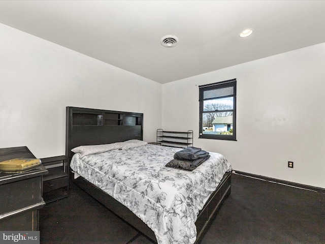 bedroom with visible vents and recessed lighting