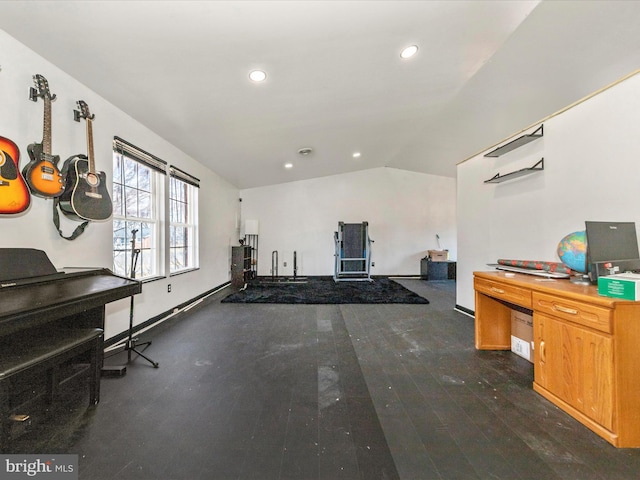 interior space with lofted ceiling, dark wood finished floors, and recessed lighting