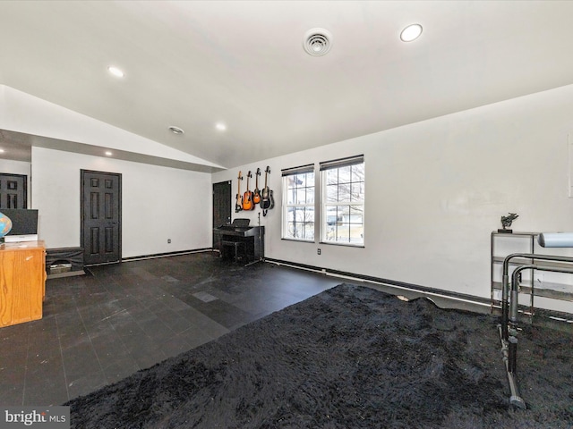 unfurnished living room featuring visible vents, vaulted ceiling, and recessed lighting