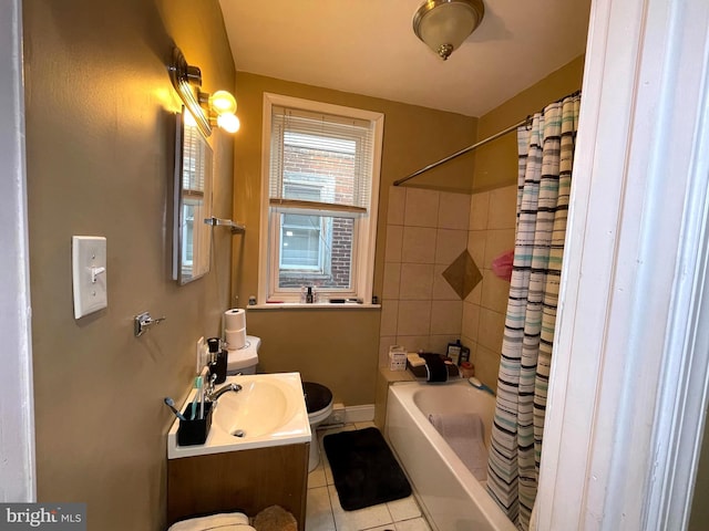 full bathroom with tile patterned flooring, vanity, toilet, and shower / bath combo with shower curtain