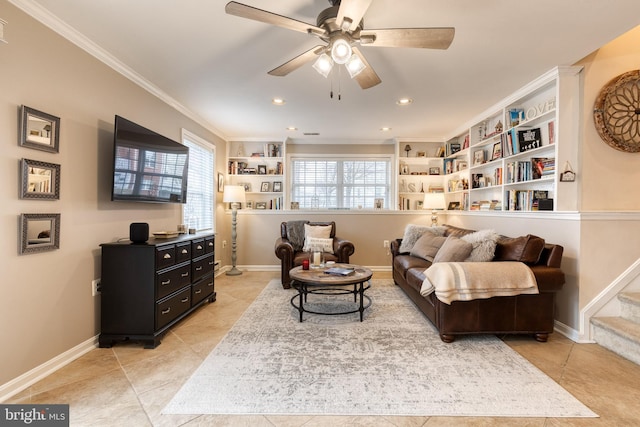 living area featuring crown molding, ceiling fan, and light tile patterned flooring