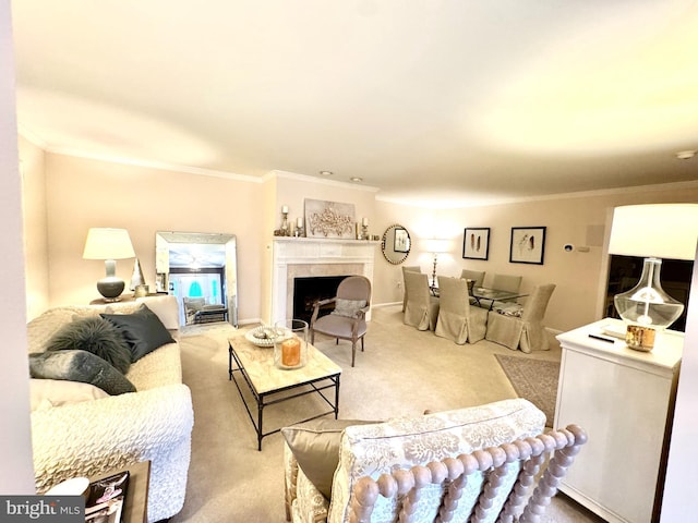 carpeted living room featuring ornamental molding and a high end fireplace