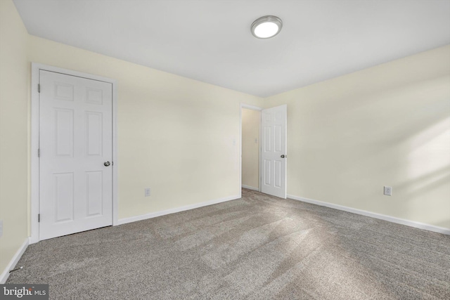 spare room with carpet