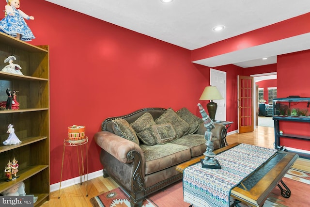 living room with light hardwood / wood-style flooring