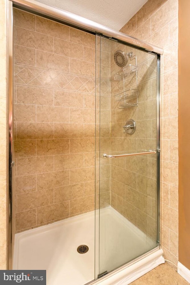 bathroom featuring walk in shower