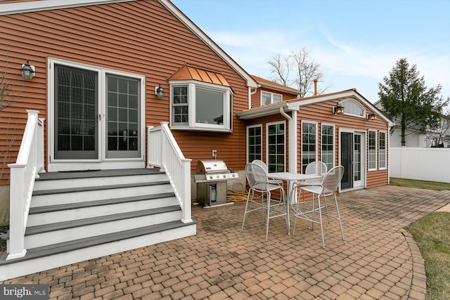 rear view of house with a patio area