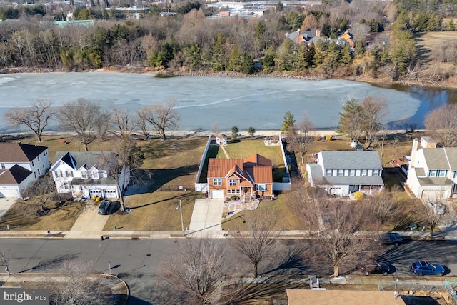 bird's eye view with a water view