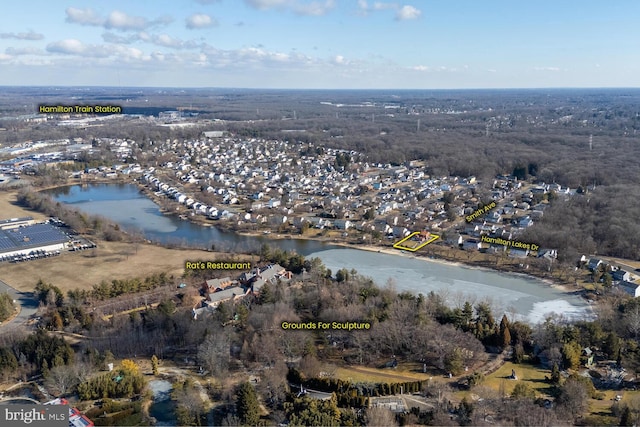 drone / aerial view featuring a water view