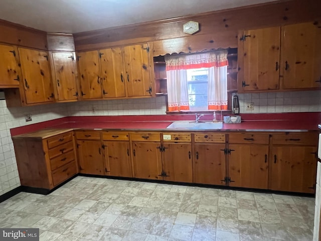 kitchen with sink and backsplash