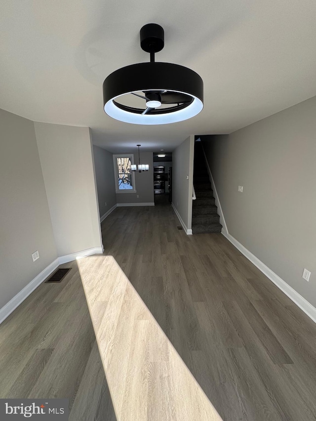 interior space with dark hardwood / wood-style flooring