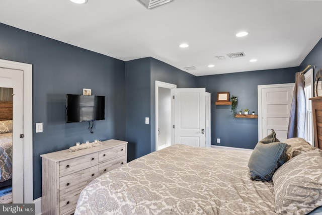 bedroom with recessed lighting, visible vents, and baseboards