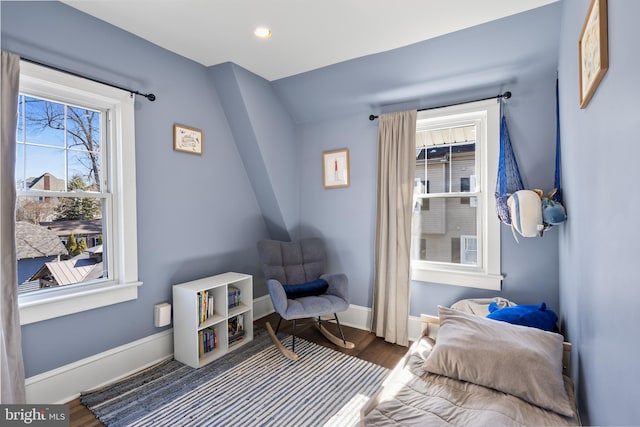 bedroom with baseboards, dark wood-style flooring, and recessed lighting