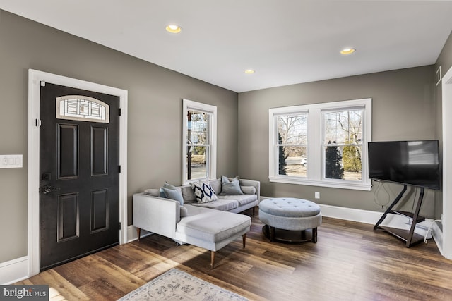 foyer entrance with baseboards, dark wood finished floors, and recessed lighting