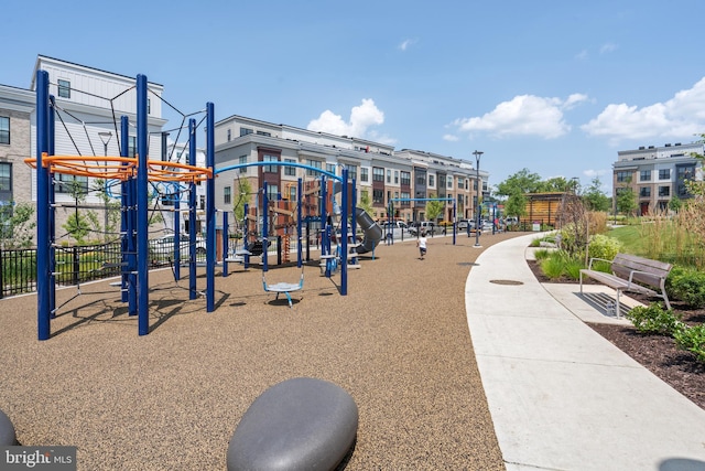 view of property's community with a playground