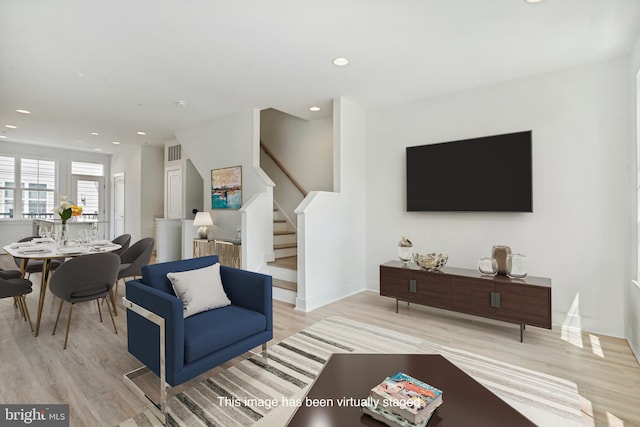 living room featuring light wood-type flooring