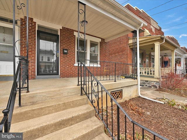 entrance to property with covered porch