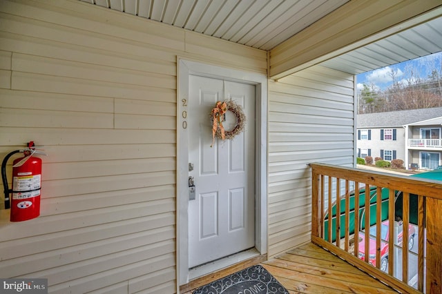 property entrance with a balcony