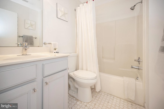 full bathroom with shower / bath combination with curtain, vanity, and toilet