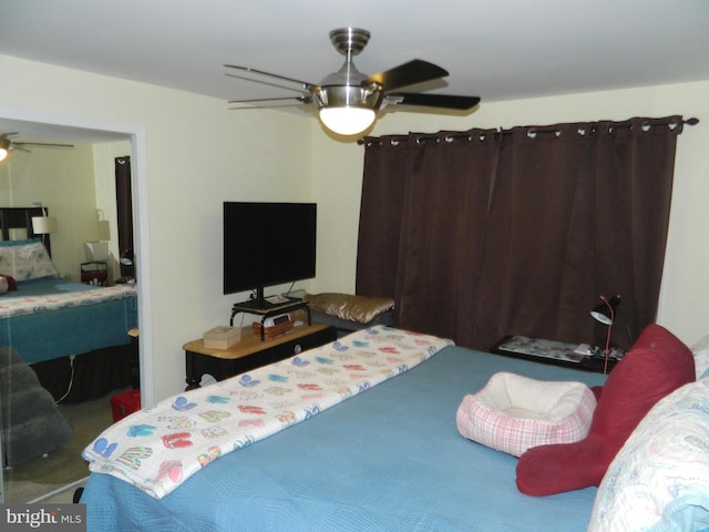 bedroom featuring ceiling fan