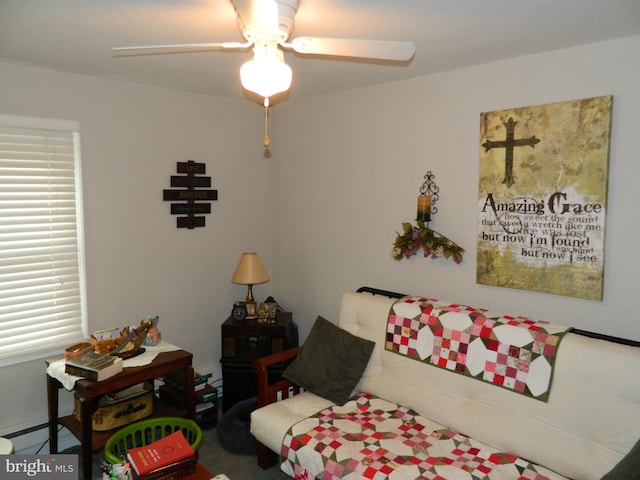 living room featuring ceiling fan