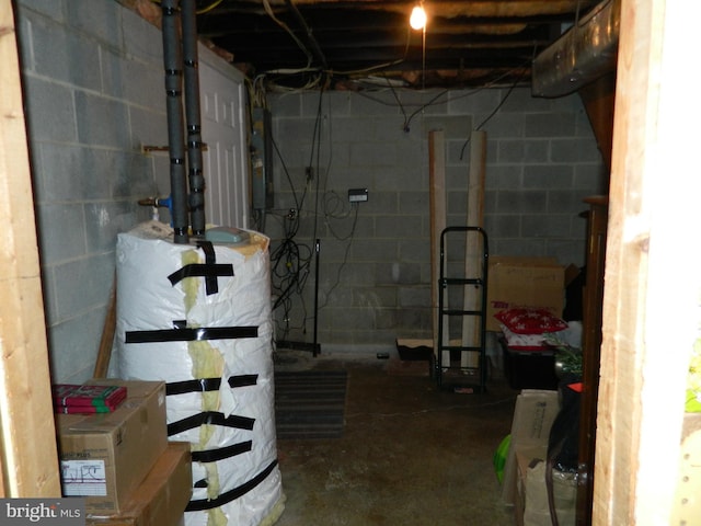 basement featuring secured water heater