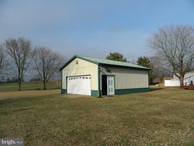 garage with a lawn