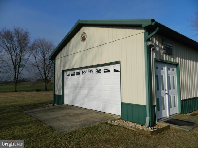 garage with a lawn