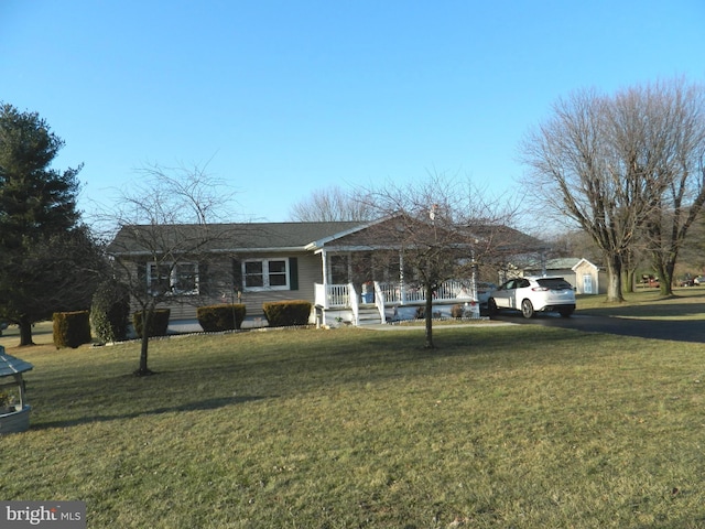 single story home featuring a front yard