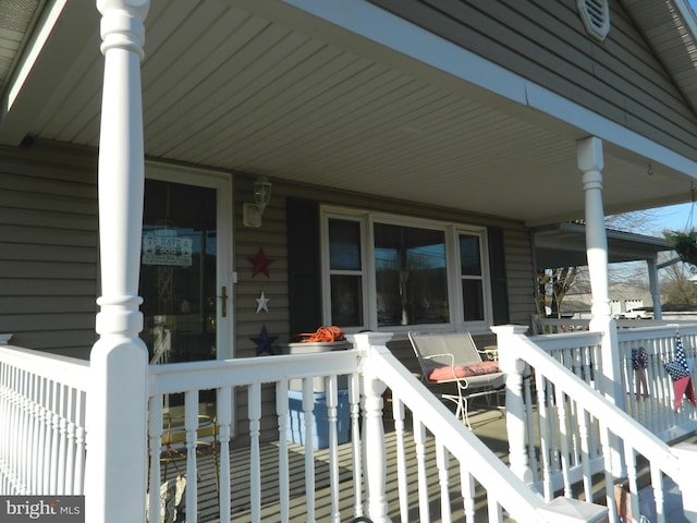 deck featuring covered porch