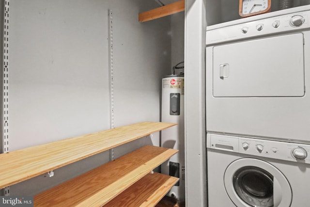 laundry area featuring stacked washer and dryer