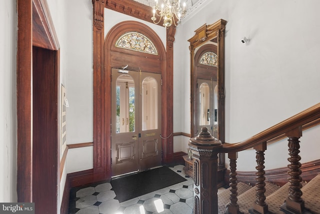 foyer featuring an inviting chandelier