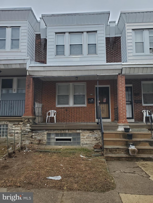 multi unit property featuring covered porch