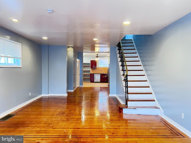 interior space featuring ceiling fan and hardwood / wood-style floors