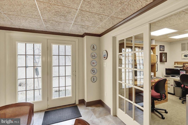 doorway featuring baseboards, french doors, plenty of natural light, and crown molding