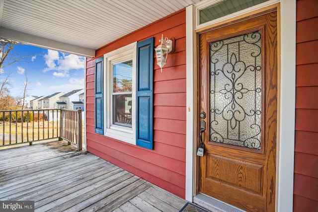 doorway to property featuring a porch